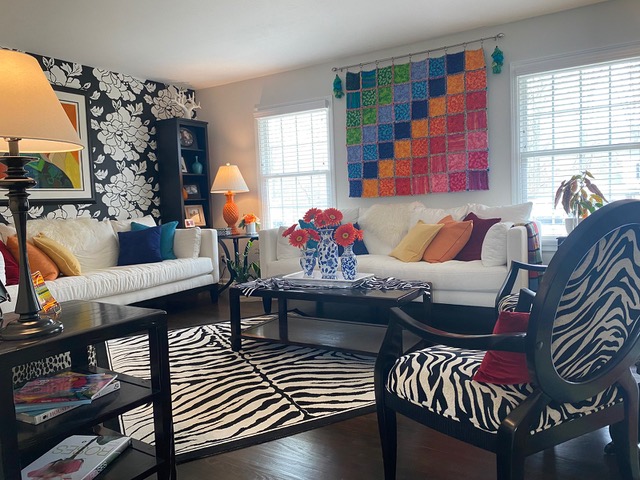 multicolored living room with accents of zebra and black finishes